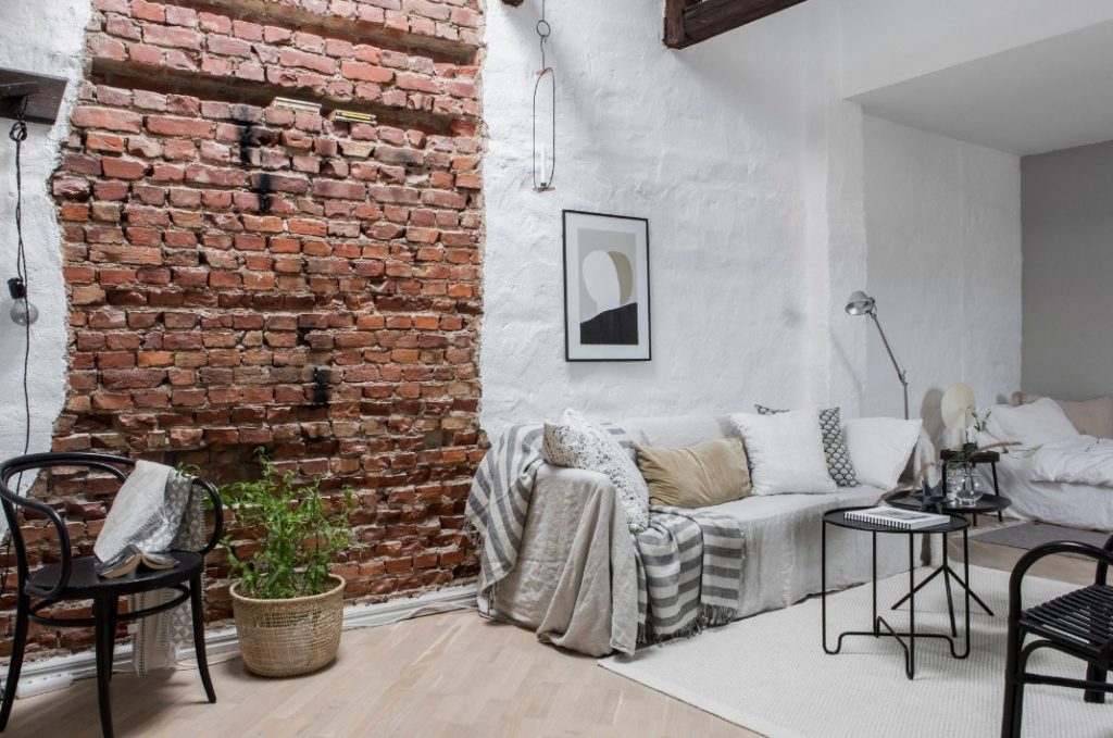 Кирпичные стены в интерьере: уют, стиль и практичность